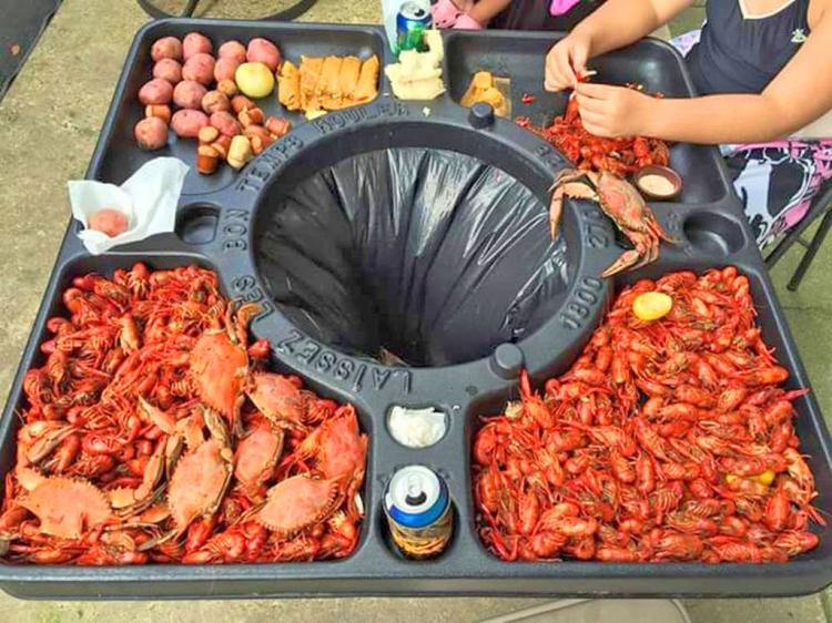 This Genius Table Has a Built-In Trash To Quickly Devour Crab, Lobster, or Crawfish